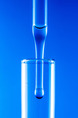 drop liquid  into a test tube
