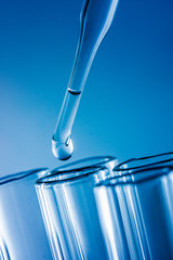 drop liquid  into a test tube