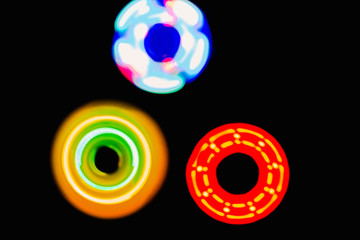 Three Colourful circle light in dark background