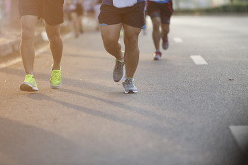 Group of people exercise race marathon in the city.