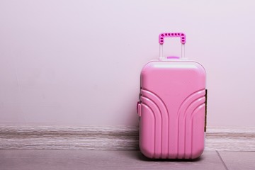 Miniature pink suitcase
