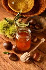 chestnuts honey in glass jar