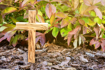 wooden cross with sunlight