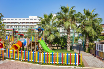 Children's playground in resort hotel on tropical vacation - Powered by Adobe