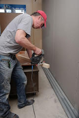 workers make repairs in the apartment