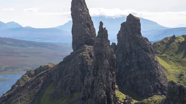 zooming Time lapse of the beautiful and unique old man of storr rock in isle of skye, scotland on sunny day
