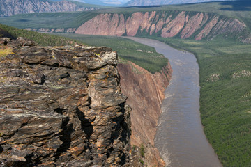 Top view on the valley of a mountain river. Ridge Chersky, Yakutia, Russia.
