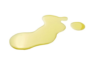 Puddle of olive oil isolated on white background and texture, with clipping path