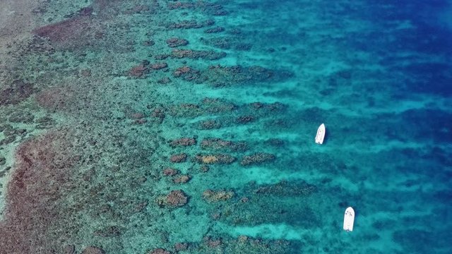 Aerial Image of Boats and Beautiful Caribbean Reef