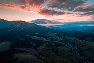 Aerial view of the village in the Carpathian mountains on the Sunset