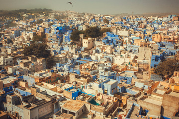 Obraz premium Cityscape with many colorful houses of city Jodhpur of Rajasthan in India