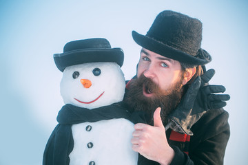Man or hipster with beard giving thumbs up hand