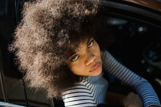 Charismatic woman poses for portrait