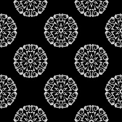 White flowers on black background. Ornamental seamless pattern