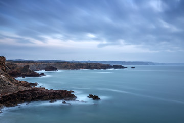 Fototapeta na wymiar Dramatic landscape of the sea before storm in Sagres Portugal
