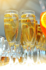 Glasses with champagne on the bar
