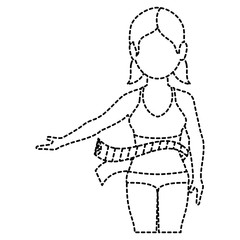 slim woman in a sports suit with tape measure