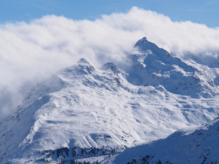 Alpine peak in cloud