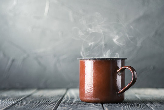 Mug with hot coffee