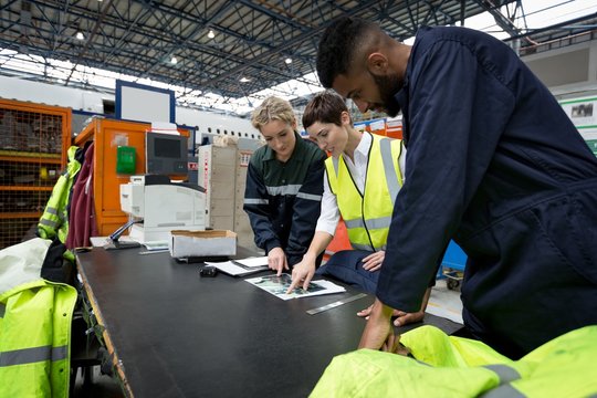 Maintenance engineers interacting with each other