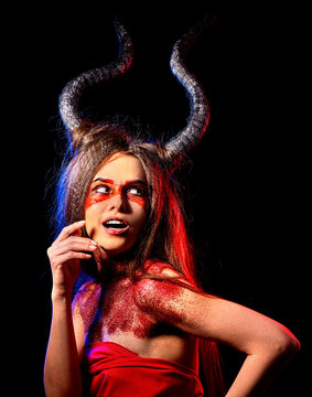 Mad satan woman on black magic ritual of in hell. Witch reincarnation mythical creature on Sabbath. Devil with soul Halloween. Zodiac astrology. Astral travel. Black magic on red background.