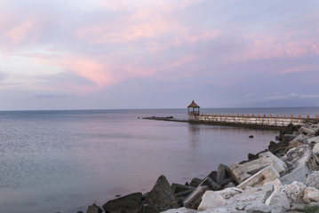 Fototapeta na wymiar Picturesque Sunrise Sea Morning Pink Clouds