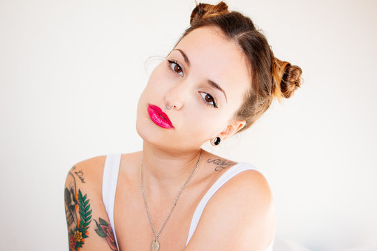 Portrait of young woman with chignons