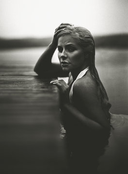 Swedish Girl with a Jetty on a Lake