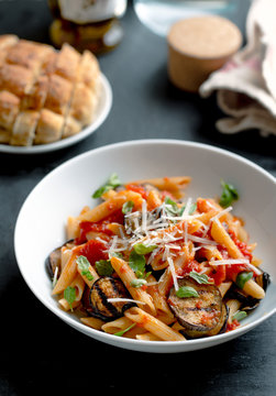 Pasta with eggplant and tomato.