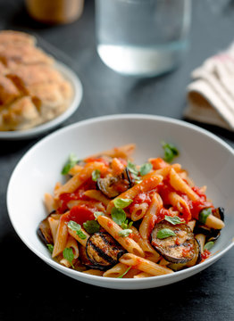 Pasta with eggplant and tomato.