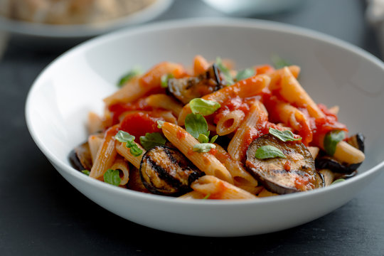 Pasta with eggplant and tomato.