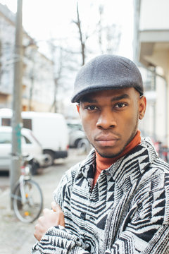 Outdoor Portrait of Stylish Young Black Man