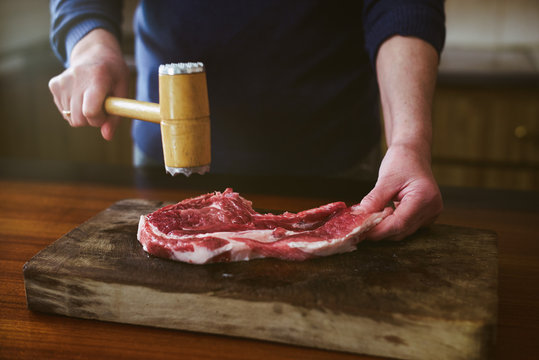 Preparing to cook a piece of meat