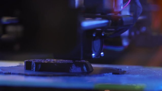 3d printer printing. Close up process of new printing technology