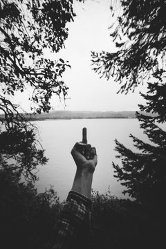 Hand Flipping Off in Nature