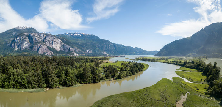 Beautiful panoramic aerial view of Squamish, North of Vancouver, British Columbia, Canada. Taken during a sunny summer day.