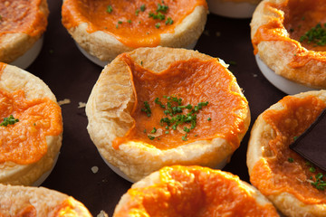 bowls of cheese pastry soup