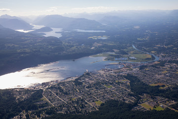 Small Town of Port Alberni on Vancouver Island, British Columbia, Canada. Taken from an aerial view during a sunny summer day.