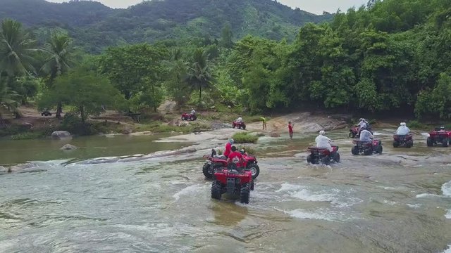 Flycam View Men Get Stuck in River Driving Quadricycles