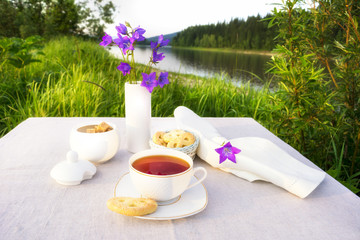 Summer tea time concept with blue bells