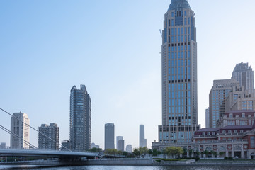 Tianjin city waterfront downtown skyline over Haihe river,China.