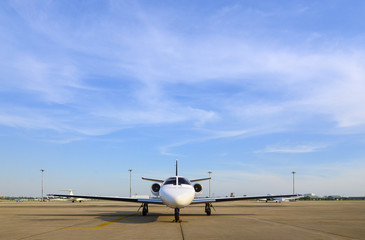 Fototapeta na wymiar Jet plane business ready for boarding with blue sky.