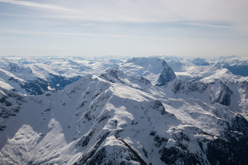 Aerial landscape view of the mountains. Taken far remote North West from Vancouver, British Columbia, Canada.