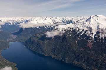 Aerial landscape view of the river joining the ocean at Jervis Inlet, in a far remote area Northwest of Vancouver, British Columbia, Canada.