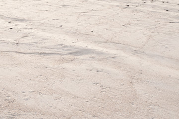 Sand on the beach as background.