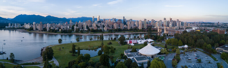 Aerial Panoramic Downtown City Skyline of Vancouver, British Columbia, Canada. Taken during bright sunny sunset.