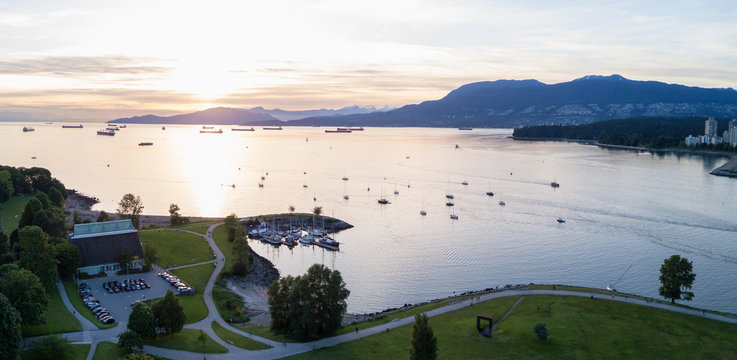 Beautiful Sunset viewed from an aerial perspective of Burrard Inlet from Kits Point, Vancouver, BC, Canada.