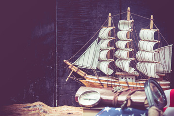 Columbus day and world map with compass
