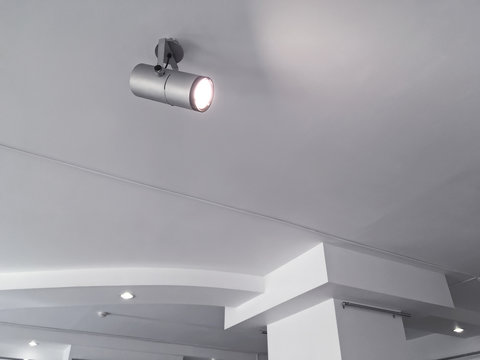 exhibition lighting system. bright halogen spotlights on exhibition ceiling.