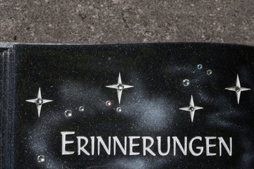 cemetery memory keepsake decoration beside tomb